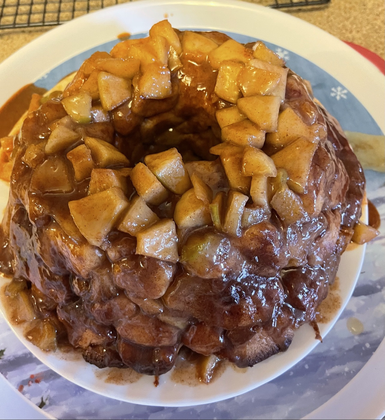 Bob's finished apple pie monkey bread covered with glossy cinnamon apples