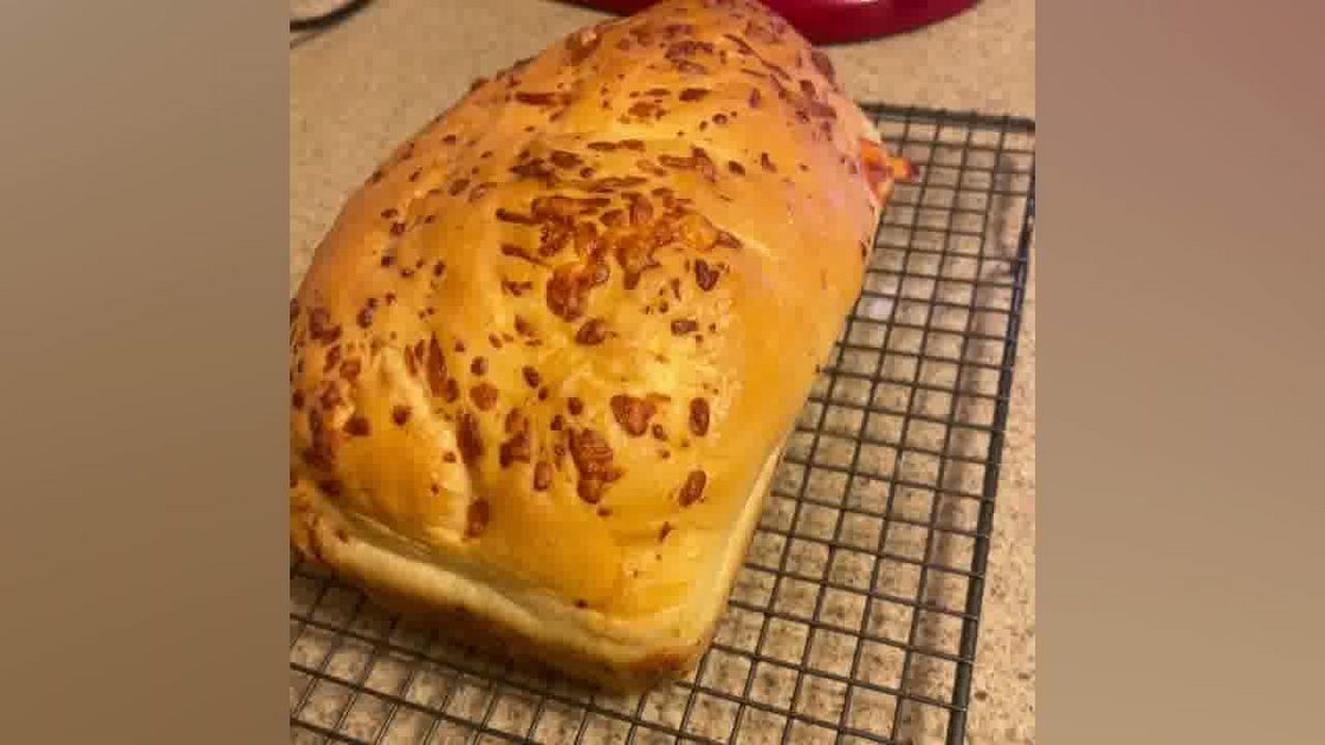 Whole cheddar loaf shown in Bob's video