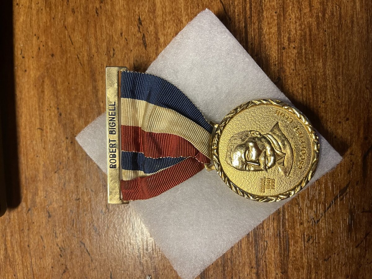 Gold Escoffier Club medal with a red, white and blue ribbon engraved Robert Bignell