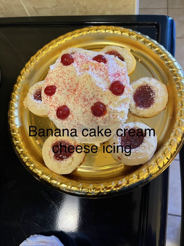 Banana cake with cream cheese icing and thumbprint cookies