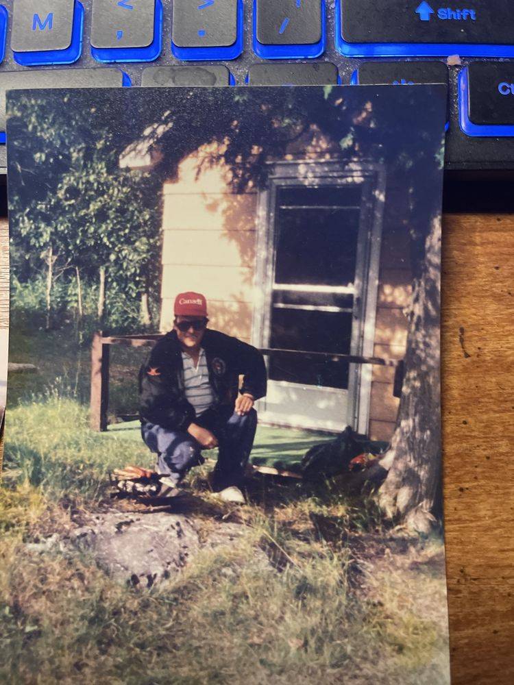 Bob outside a cabin on Manitoulin Island