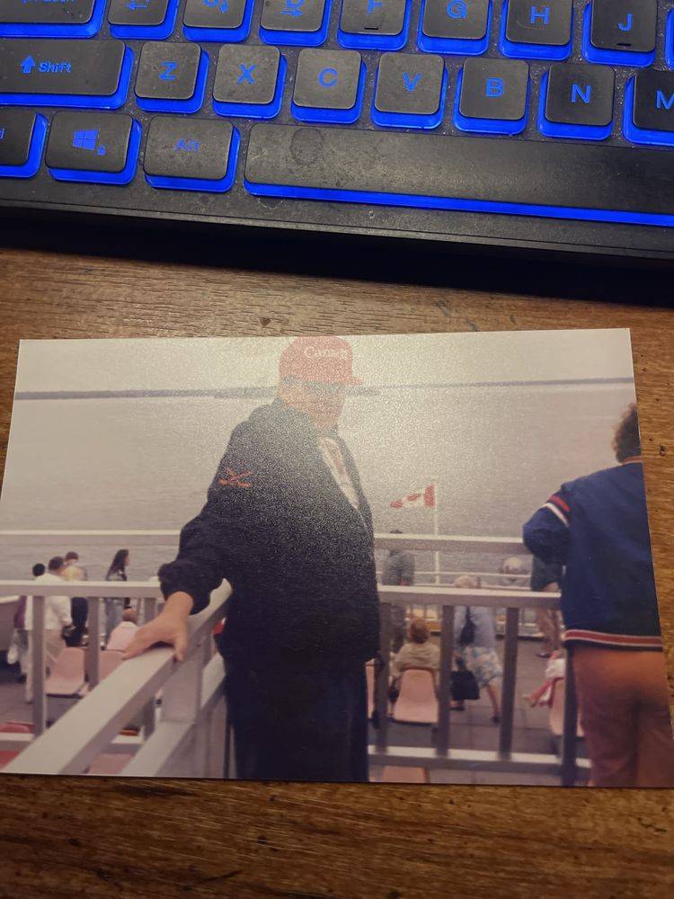 Bob wearing a red Canada cap on the ferry to Manitoulin Island